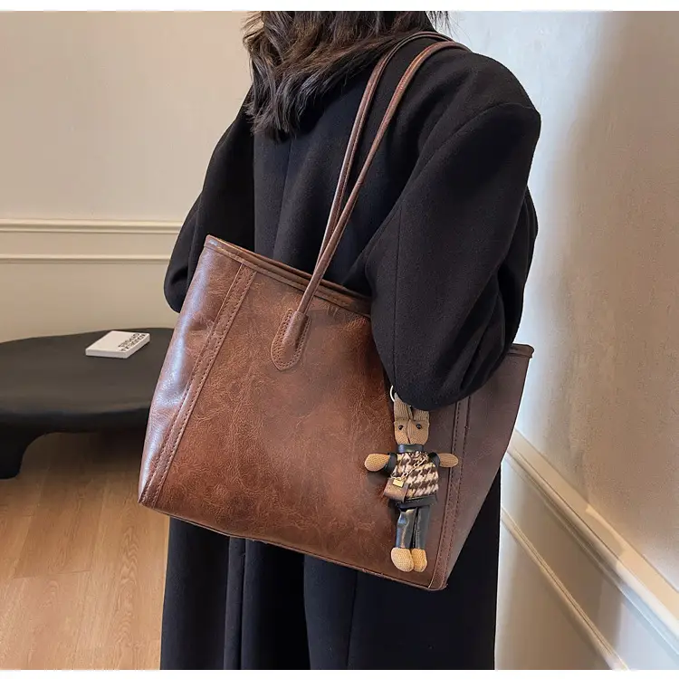 Women's Cross-Country Leather Tote Bag Cream Brown β feature 24