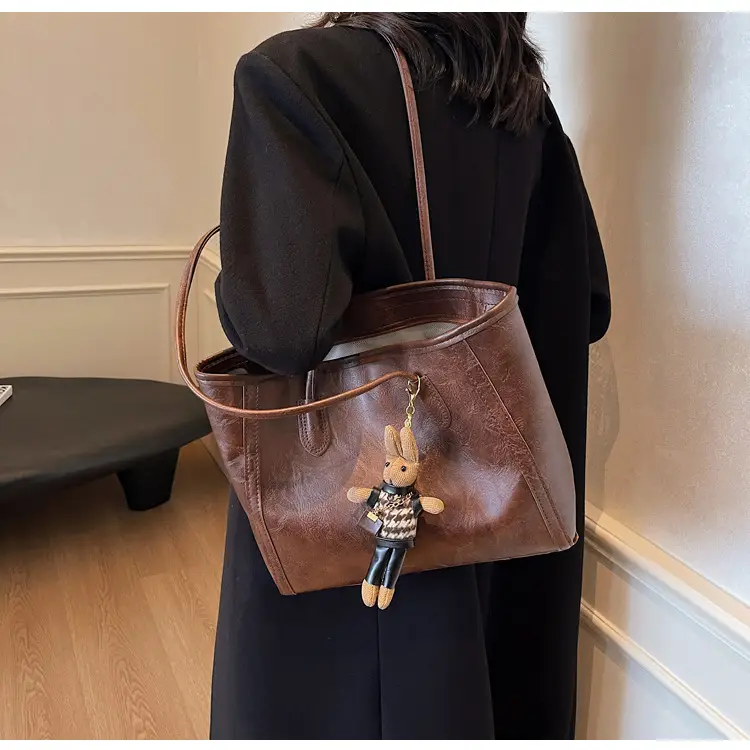 Women's Cross-Country Leather Tote Bag Cream Brown β feature 25