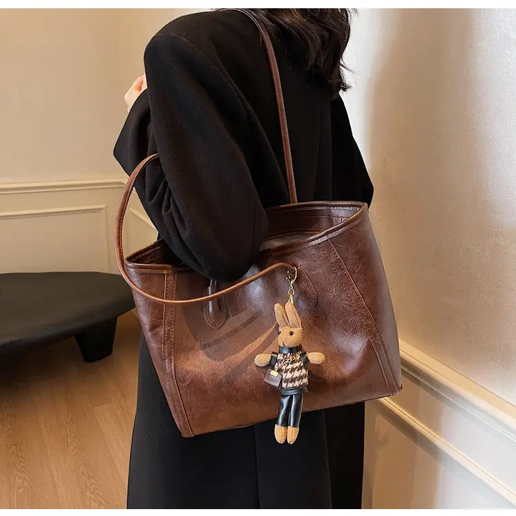 Women's Cross-Country Leather Tote Bag Cream Brown β feature 26