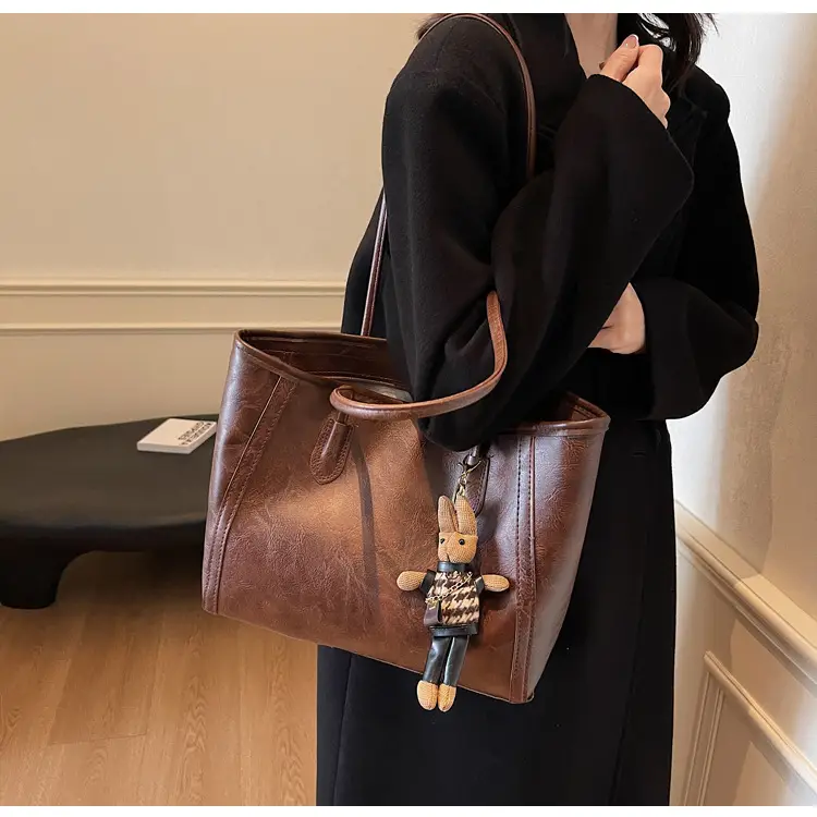 Women's Cross-Country Leather Tote Bag Cream Brown β feature 29