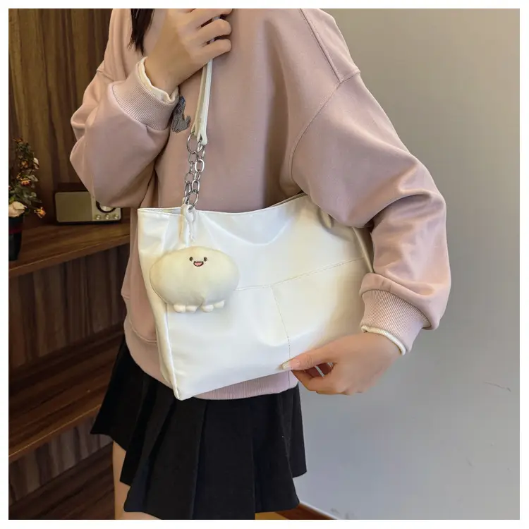 White Casual Shoulder Tote with Pom Pom Pendant — feature 12