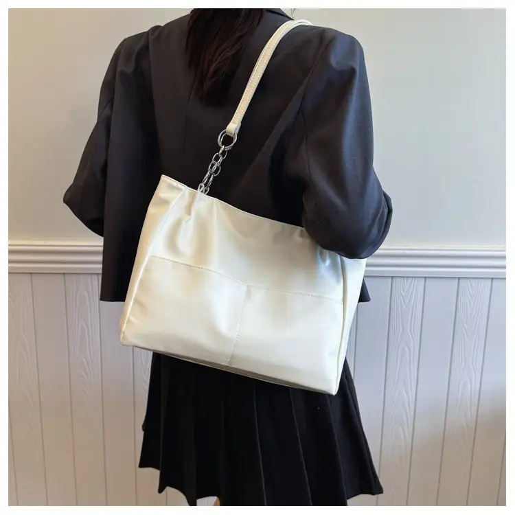 White Casual Shoulder Tote with Pom Pom Pendant — feature 13