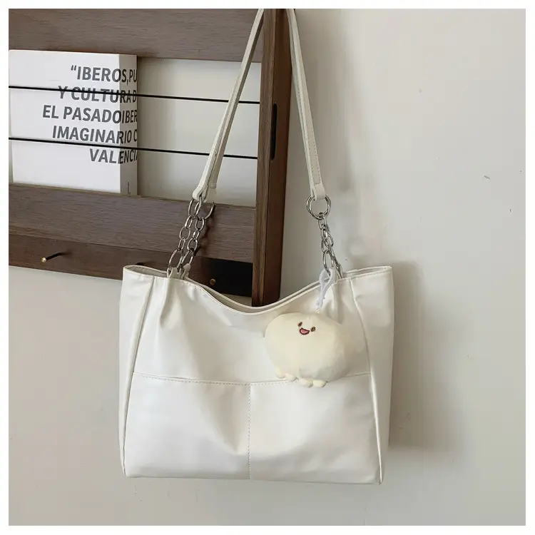 White Casual Shoulder Tote with Pom Pom Pendant — feature 16