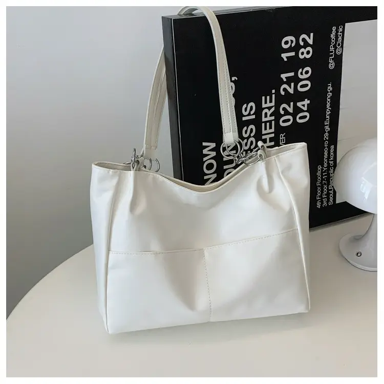 White Casual Shoulder Tote with Pom Pom Pendant — feature 17