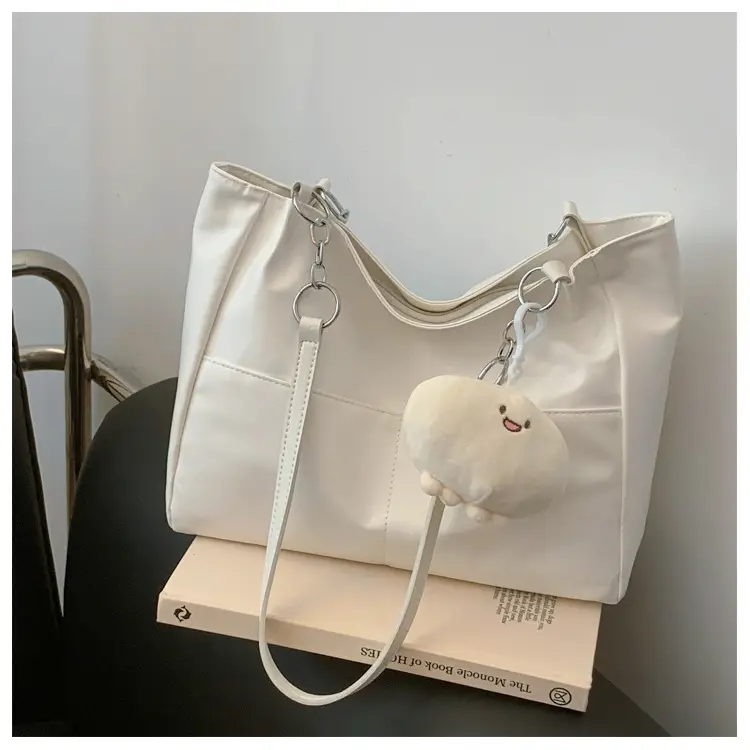White Casual Shoulder Tote with Pom Pom Pendant — feature 19