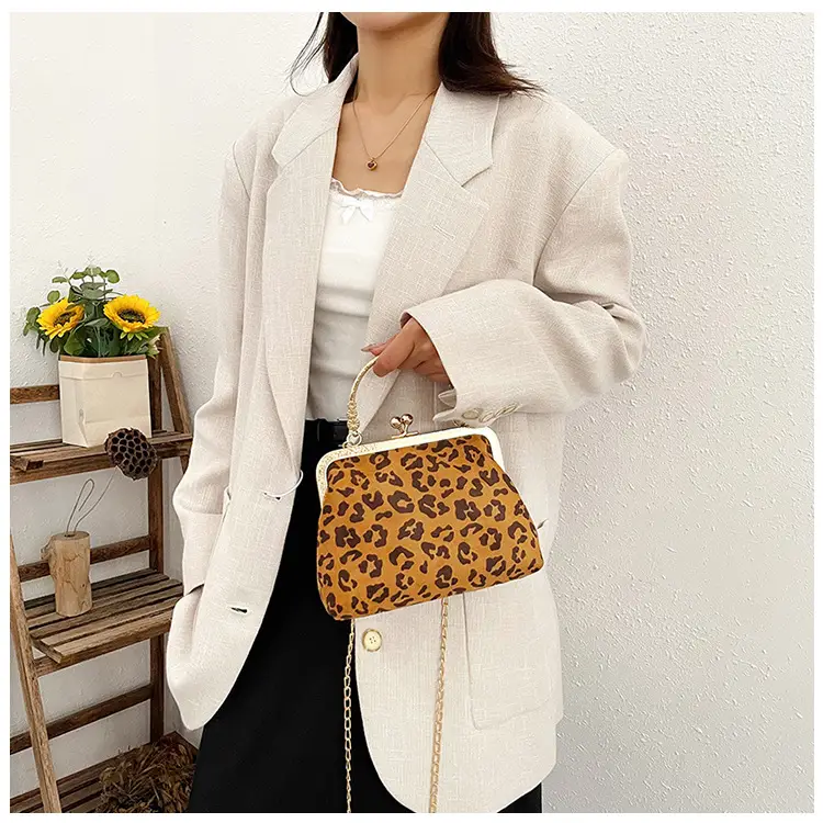 Black Textured Leather Handbag with Gold Chain & Leopard Print — feature 12