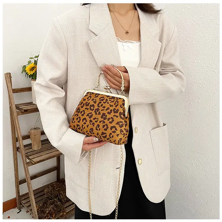Black Textured Leather Handbag with Gold Chain & Leopard Print — feature 13