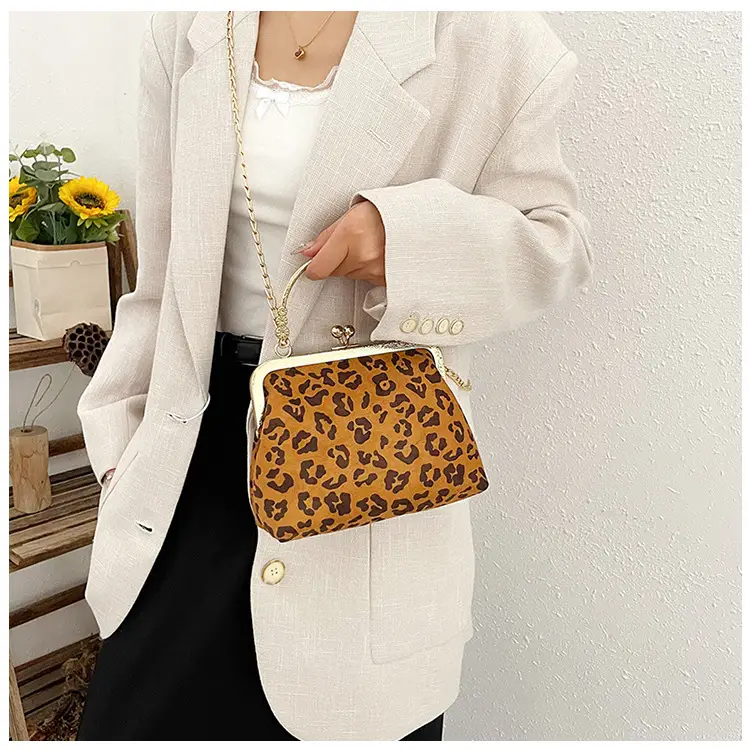 Black Textured Leather Handbag with Gold Chain & Leopard Print — feature 14