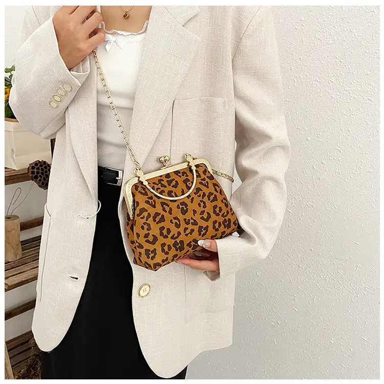 Black Textured Leather Handbag with Gold Chain & Leopard Print — feature 15