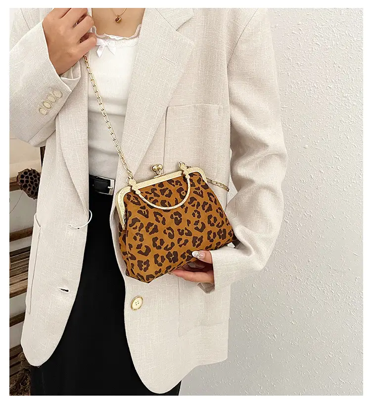 Black Textured Leather Handbag with Gold Chain & Leopard Print — feature 2
