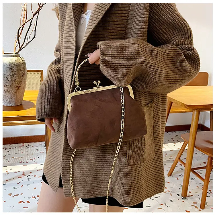 Black Textured Leather Handbag with Gold Chain & Leopard Print — feature 20