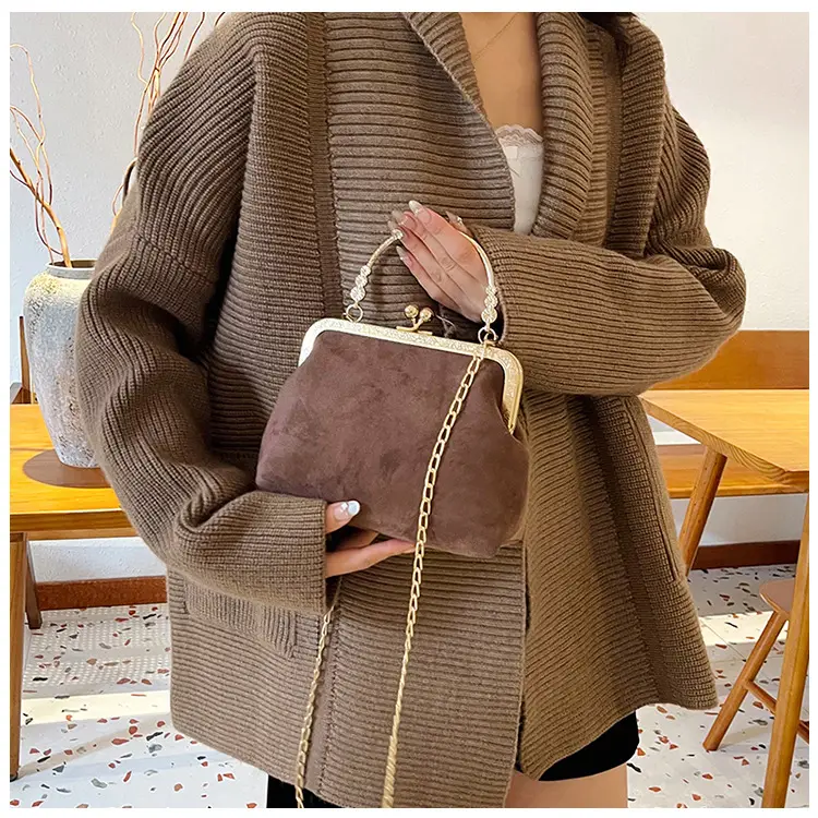 Black Textured Leather Handbag with Gold Chain & Leopard Print — feature 21