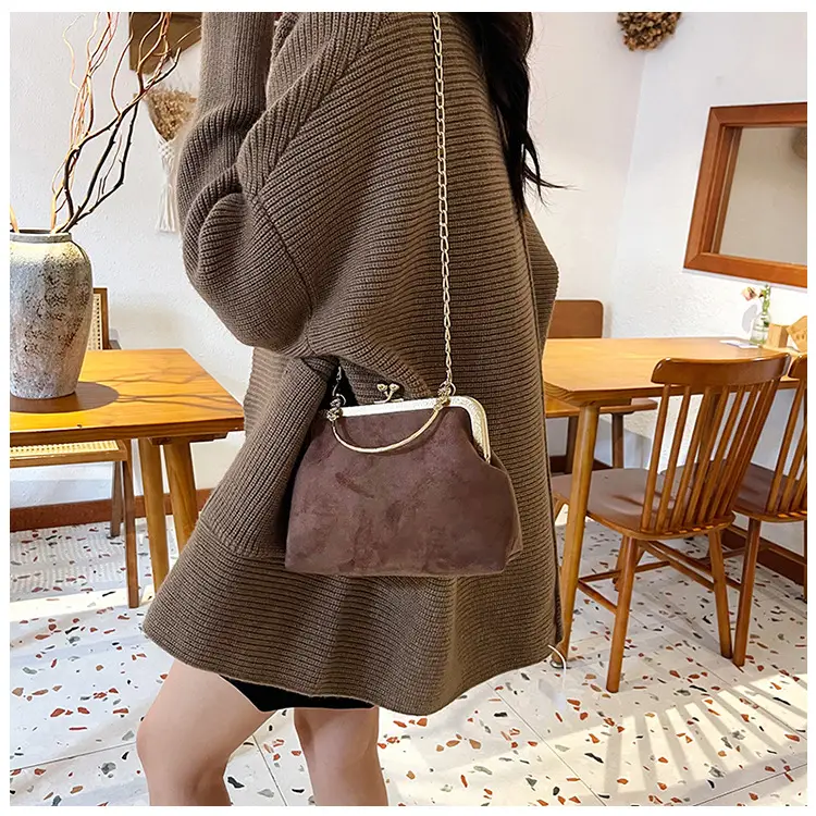 Black Textured Leather Handbag with Gold Chain & Leopard Print — feature 23