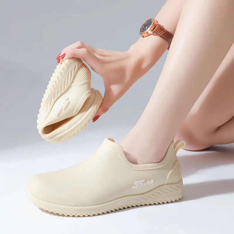 Rain boots women's fashion net red low side fleece-lined warm short tube wholesale non-slip waterproof shoes shallow mouth warm feet rubber shoes generation