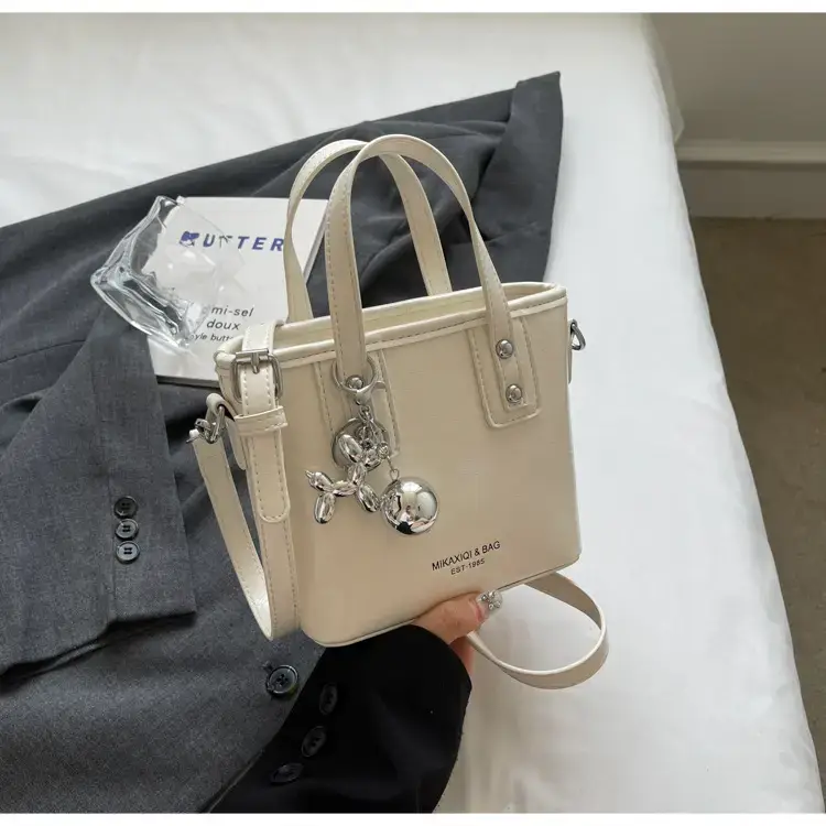 Women's High-End Bell Bag Cream 2024 — feature 17