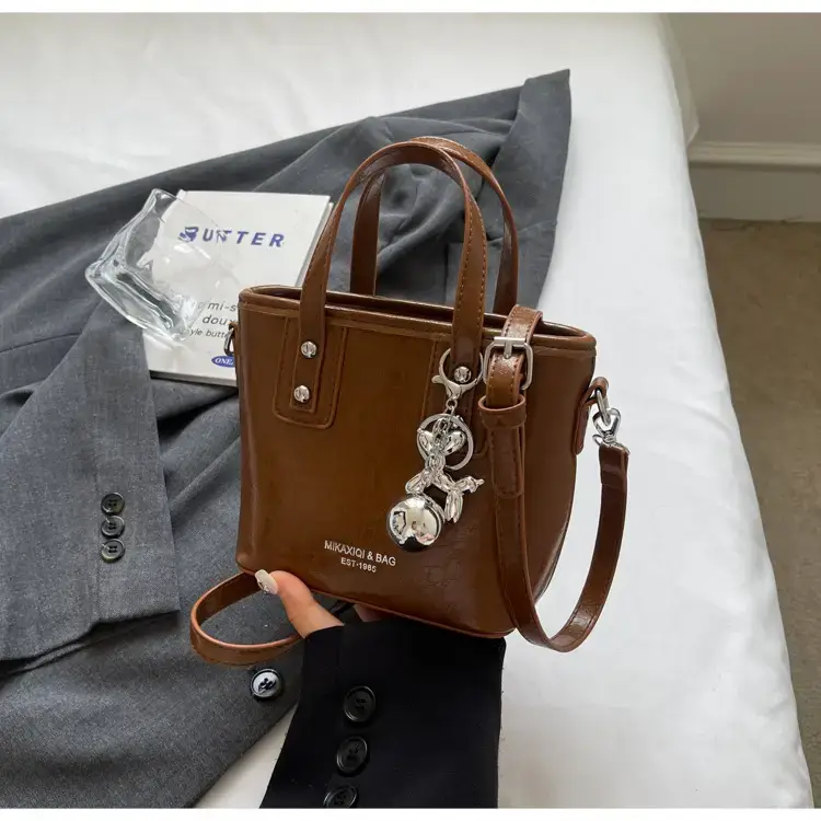 Women's High-End Bell Bag Cream 2024 — feature 19