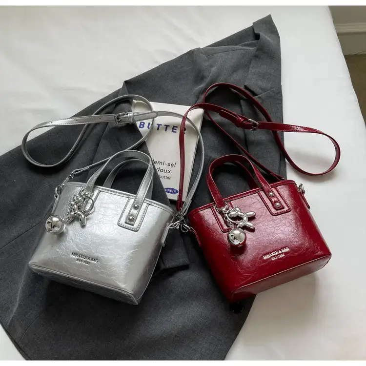 Women's High-End Bell Bag Cream 2024 — feature 27