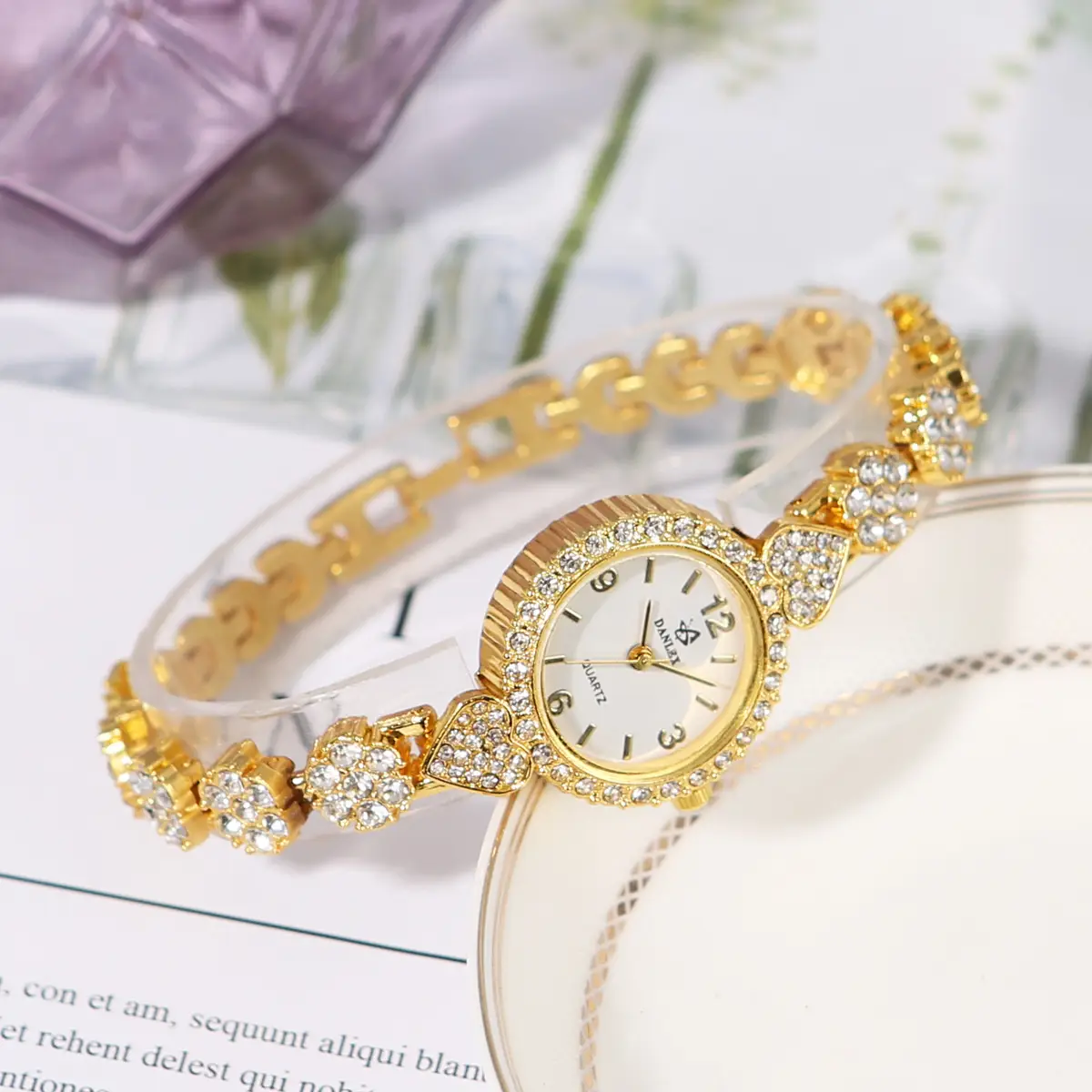 Gold Cross Bracelet Watch with Diamond Embellishment — feature 12