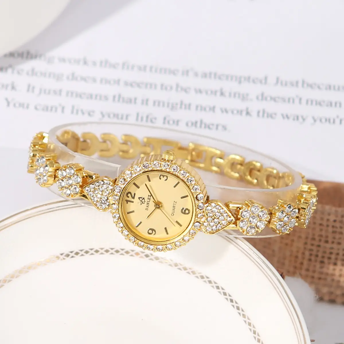 Gold Cross Bracelet Watch with Diamond Embellishment — feature 18