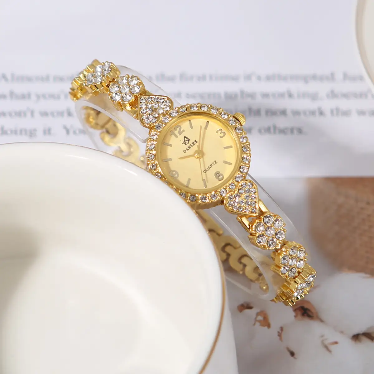 Gold Cross Bracelet Watch with Diamond Embellishment — feature 19