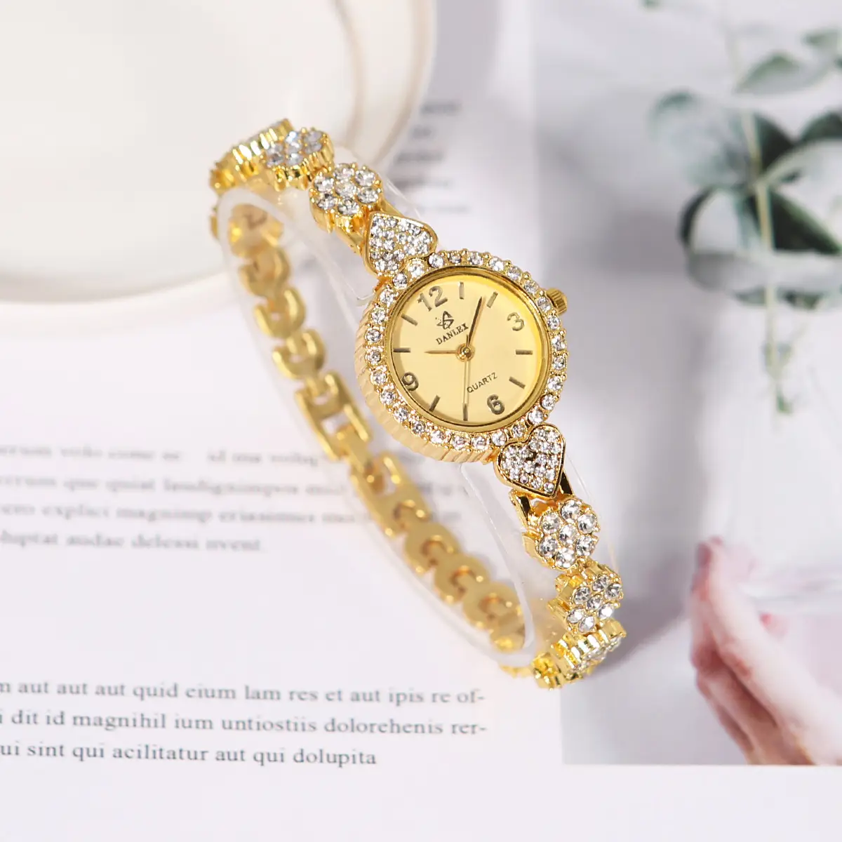 Gold Cross Bracelet Watch with Diamond Embellishment — feature 21