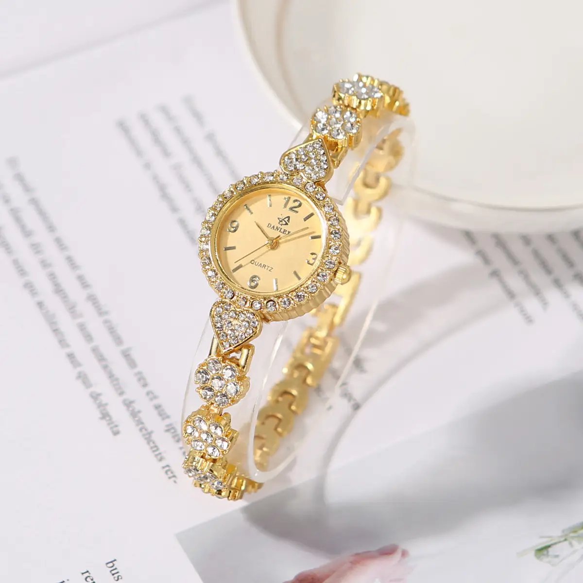 Gold Cross Bracelet Watch with Diamond Embellishment — feature 22