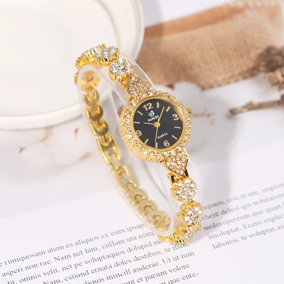 Gold Cross Bracelet Watch with Diamond Embellishment — feature 3
