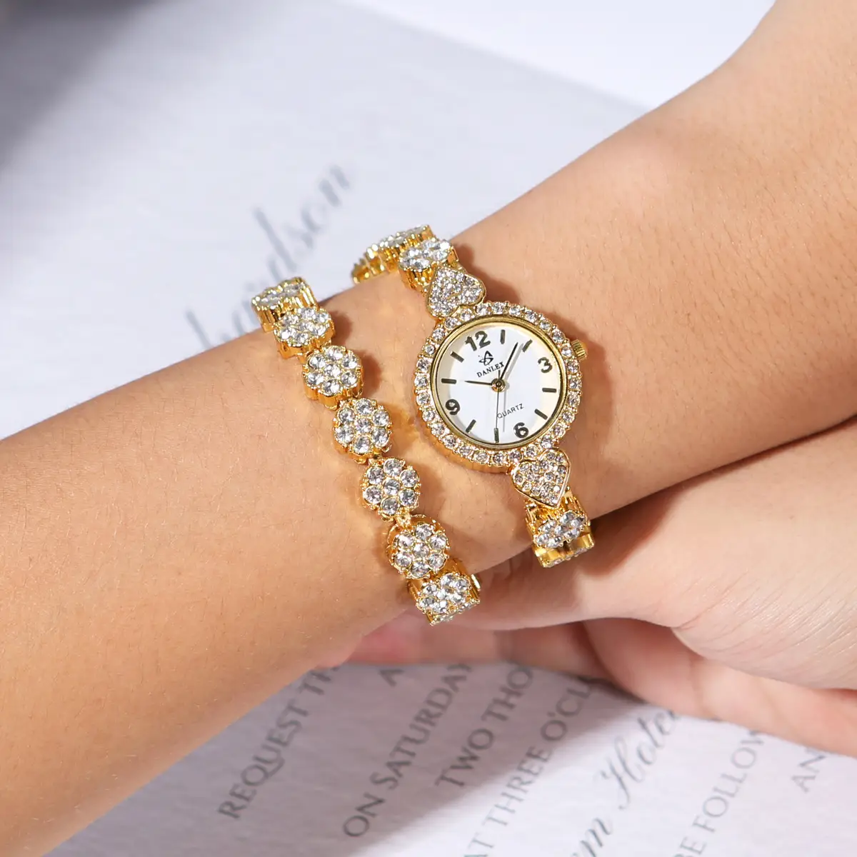 Gold Cross Bracelet Watch with Diamond Embellishment — feature 8