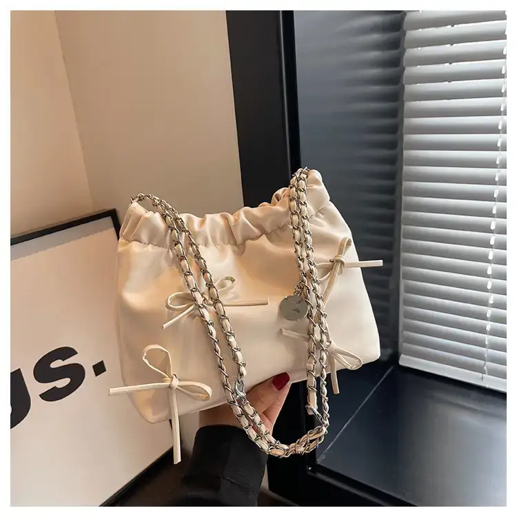 Women's Bow Chain Shoulder Bag Cream 2024 — feature 23