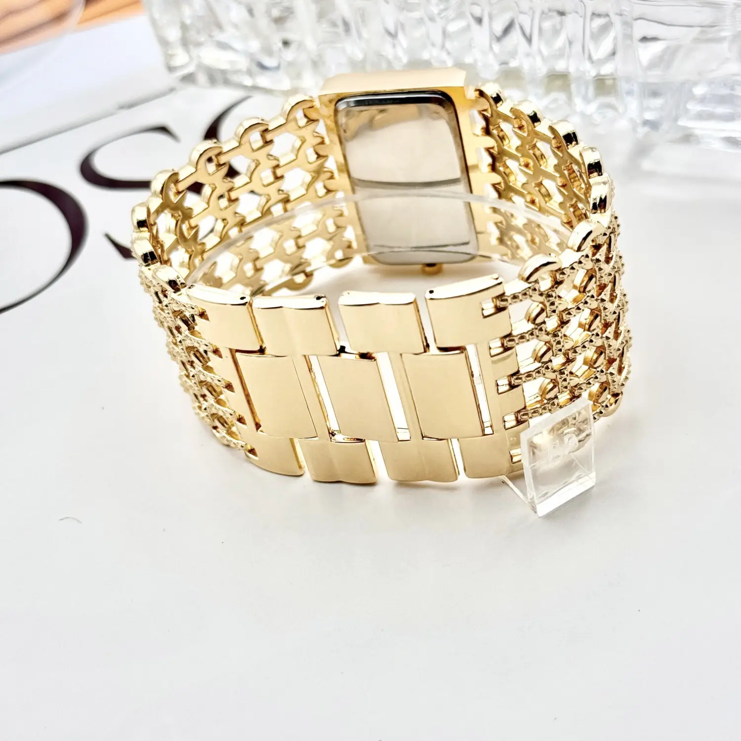 Gold Square Diamond Watch with Roman Dial & Wide Bracelet — feature 10
