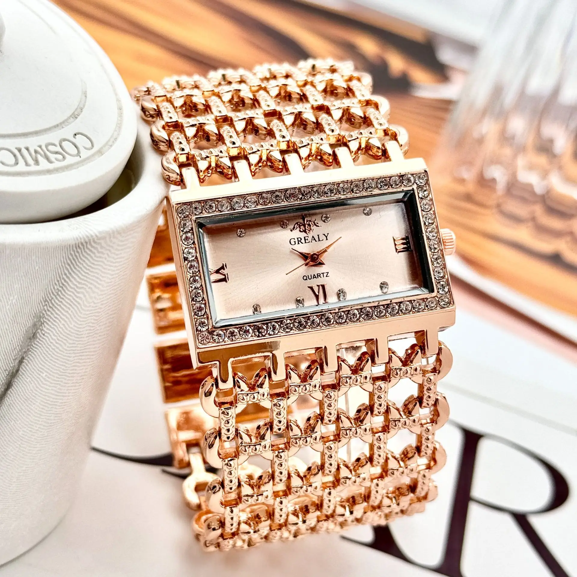 Gold Square Diamond Watch with Roman Dial & Wide Bracelet — feature 14