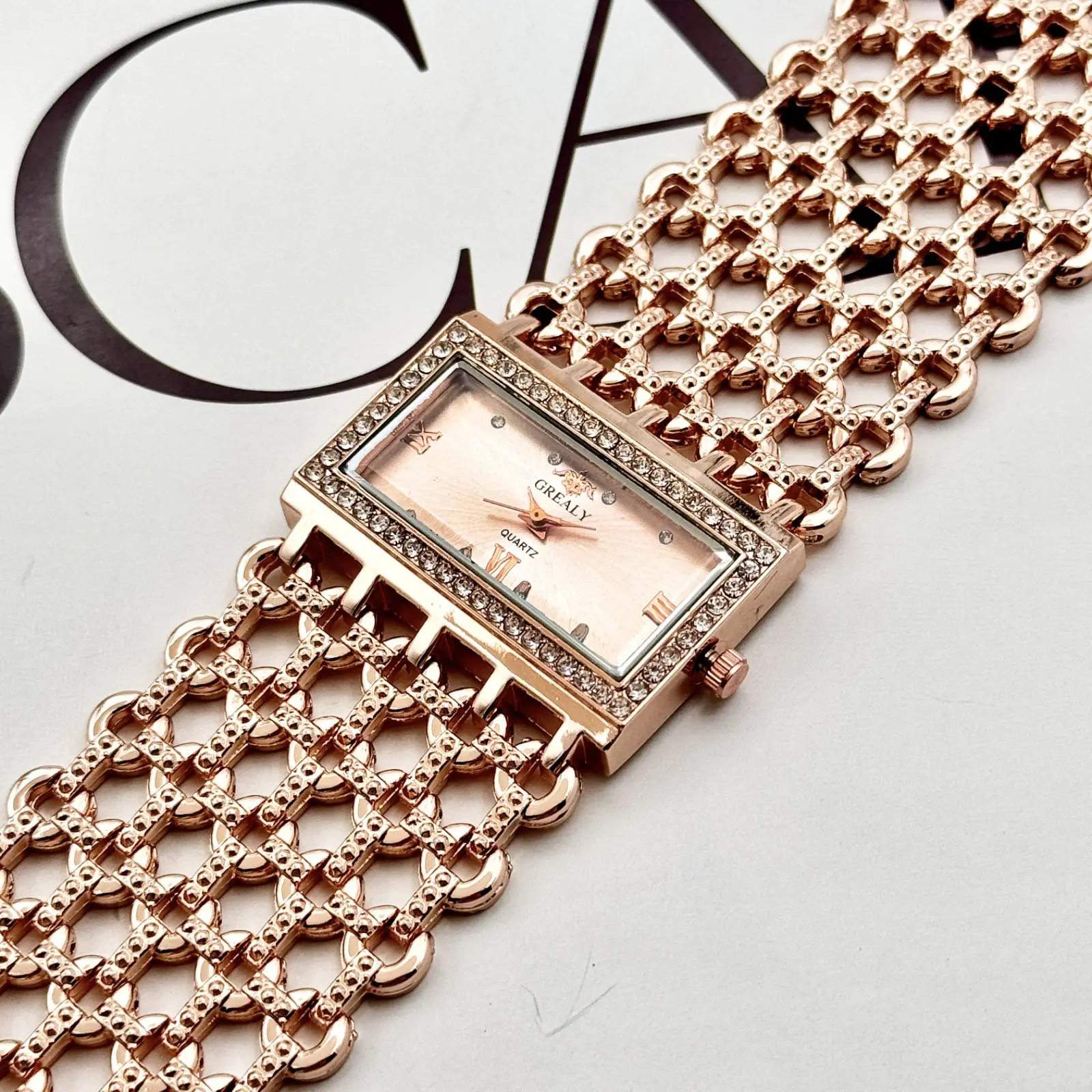 Gold Square Diamond Watch with Roman Dial & Wide Bracelet — feature 15