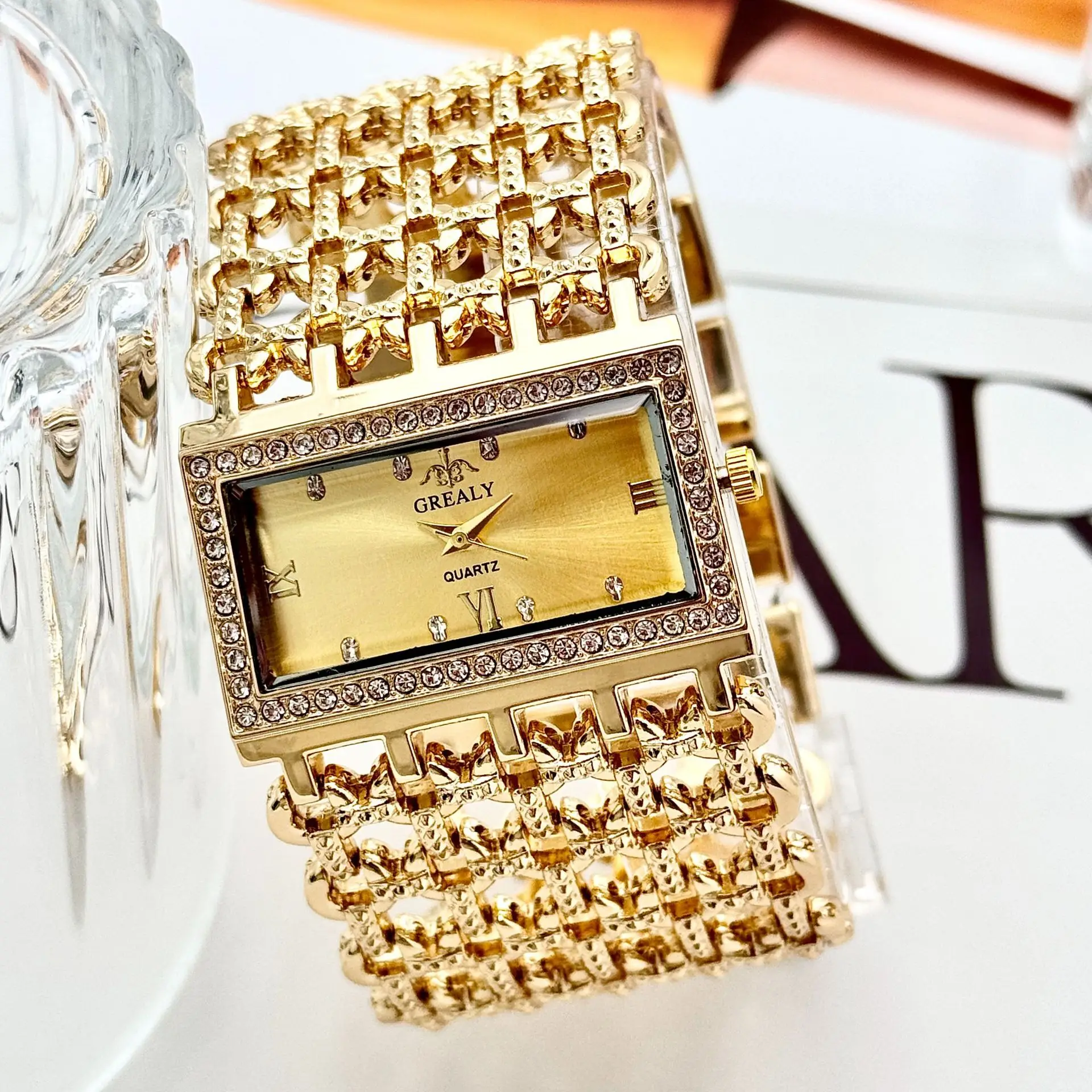 Gold Square Diamond Watch with Roman Dial & Wide Bracelet — feature 7