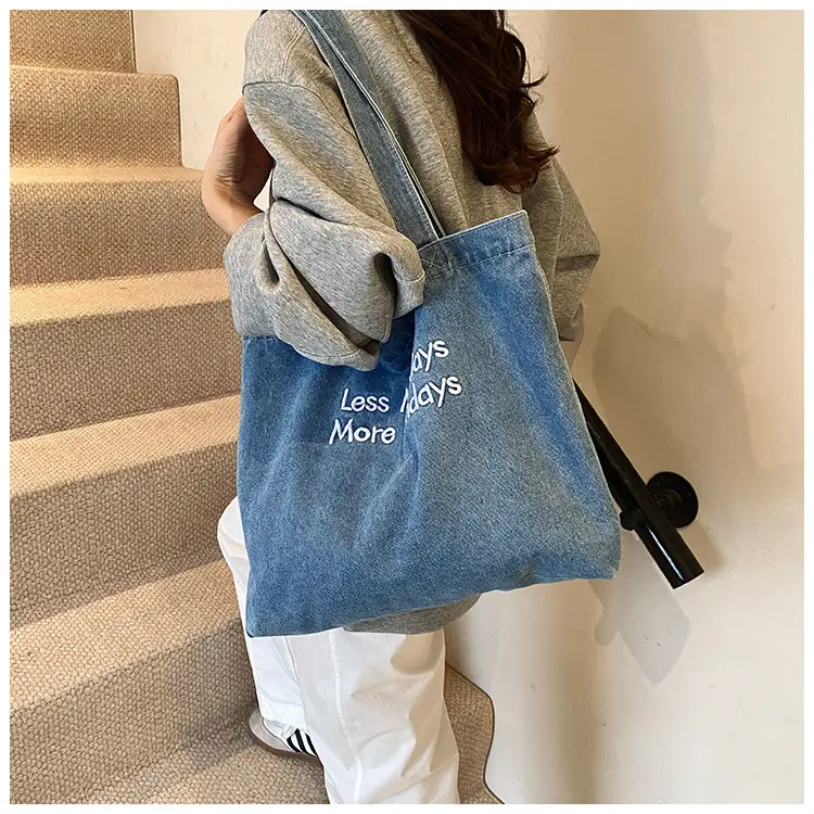 Retro Denim Shoulder Bag with Embroidered Text — feature 12