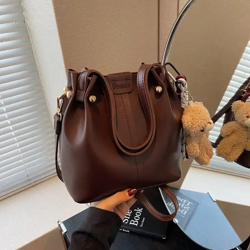 Women's Brown Leather Shoulder Bag with Pom Pom Charm