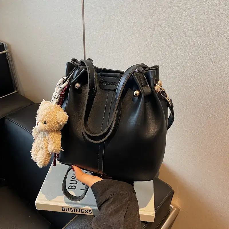 Women's Brown Leather Shoulder Bag with Pom Pom Charm