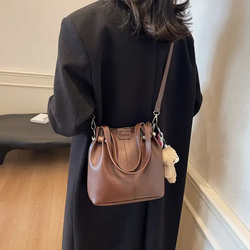 Women's Brown Leather Shoulder Bag with Pom Pom Charm