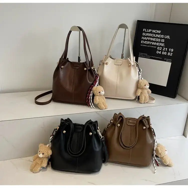 Women's Brown Leather Shoulder Bag with Pom Pom Charm — feature 14