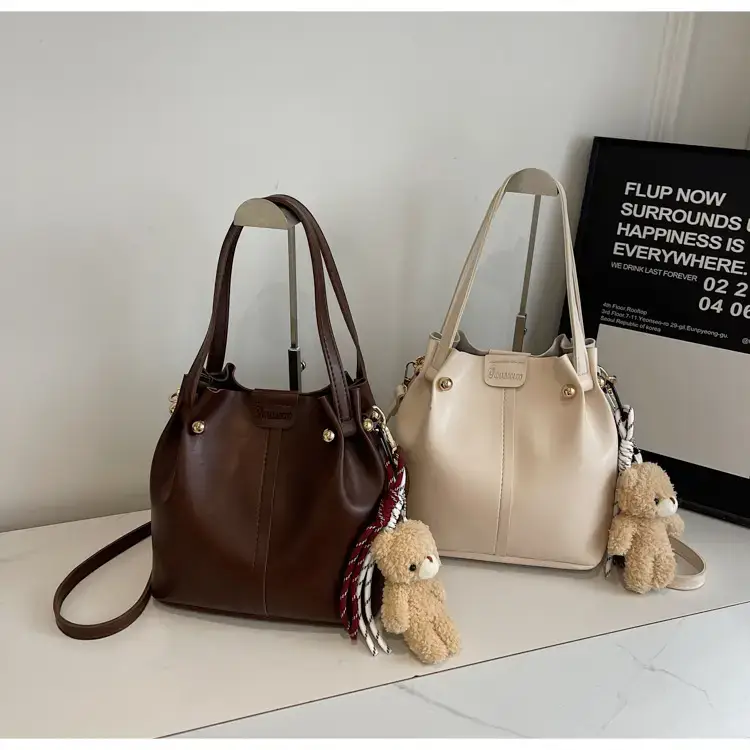 Women's Brown Leather Shoulder Bag with Pom Pom Charm — feature 15