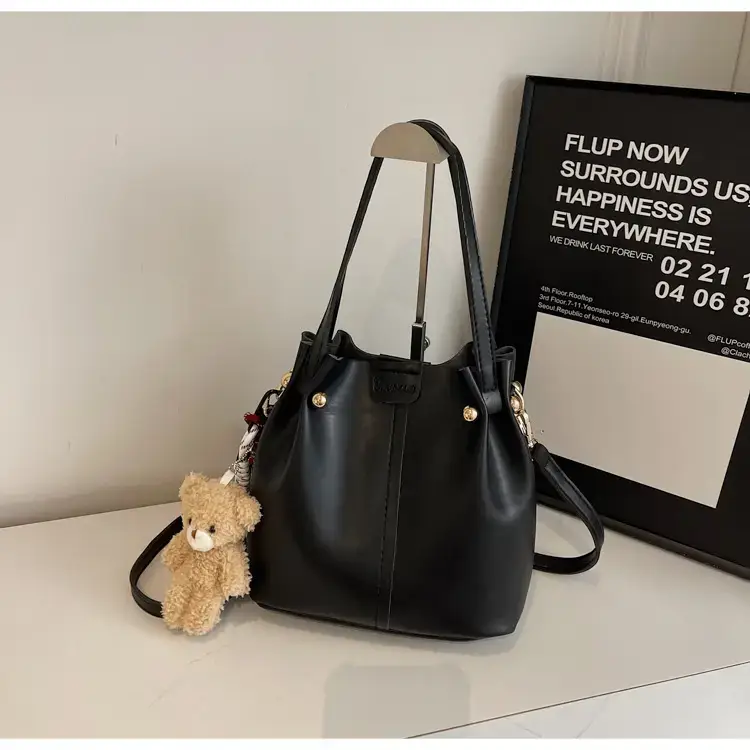 Women's Brown Leather Shoulder Bag with Pom Pom Charm — feature 19