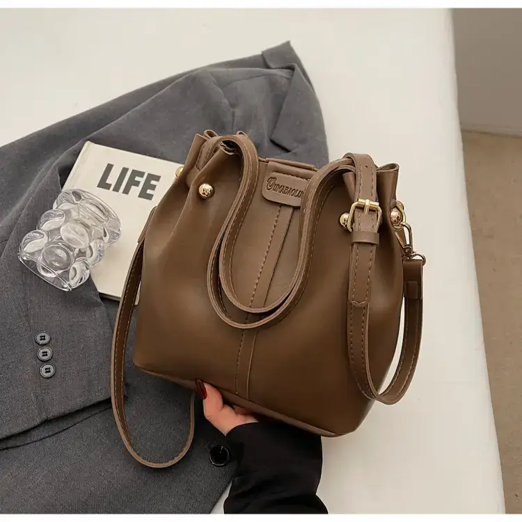 Women's Brown Leather Shoulder Bag with Pom Pom Charm — feature 22