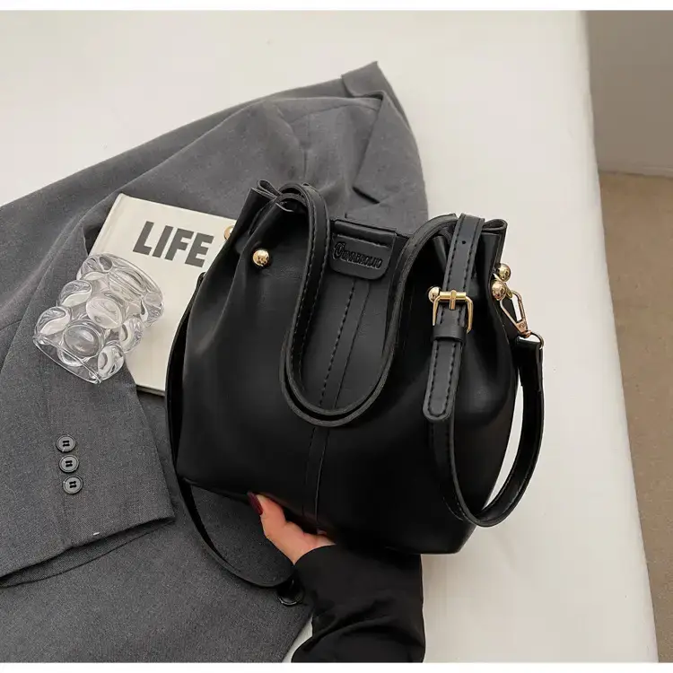 Women's Brown Leather Shoulder Bag with Pom Pom Charm — feature 25