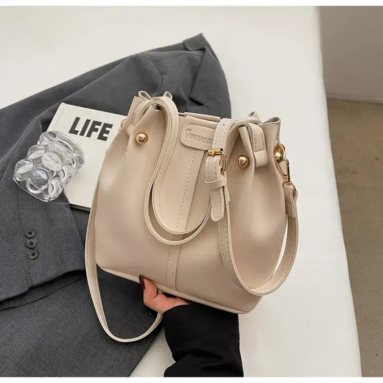 Women's Brown Leather Shoulder Bag with Pom Pom Charm — feature 26