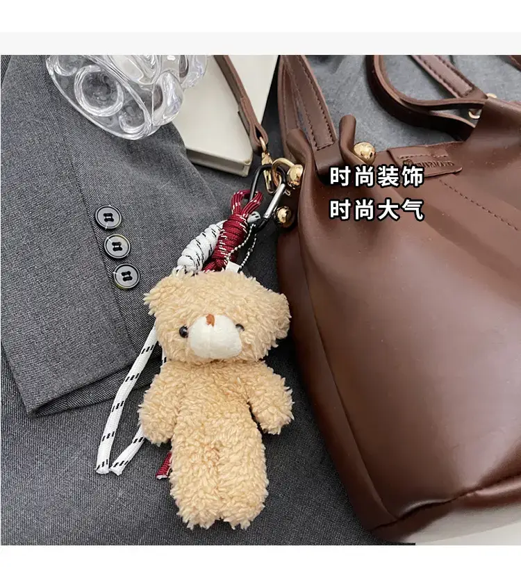 Women's Brown Leather Shoulder Bag with Pom Pom Charm — feature 7