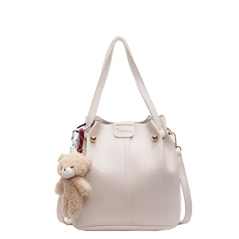 Women's Brown Leather Shoulder Bag with Pom Pom Charm