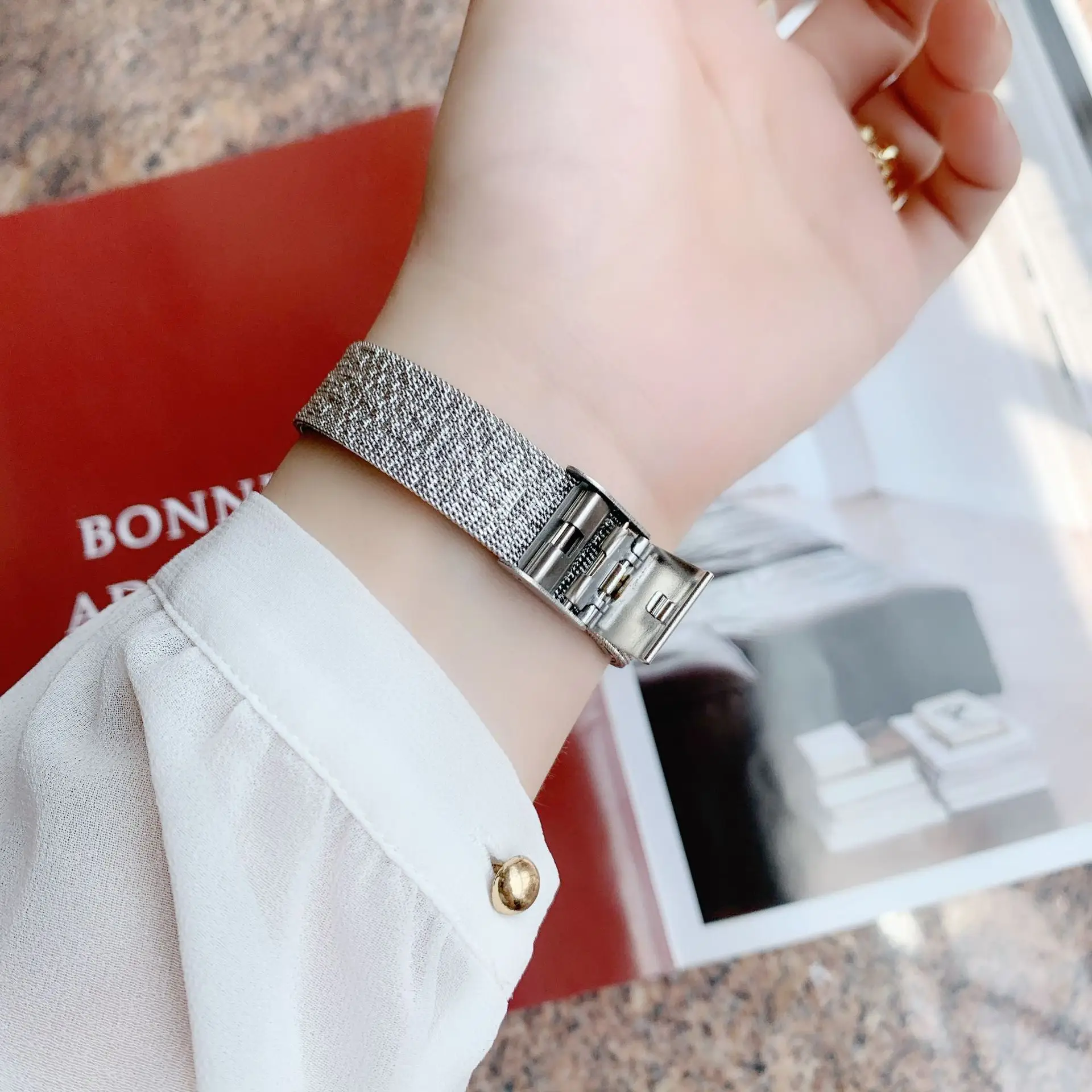 Elegant Silver Steel Watch for Women with Wind Resistant Design - Image 5