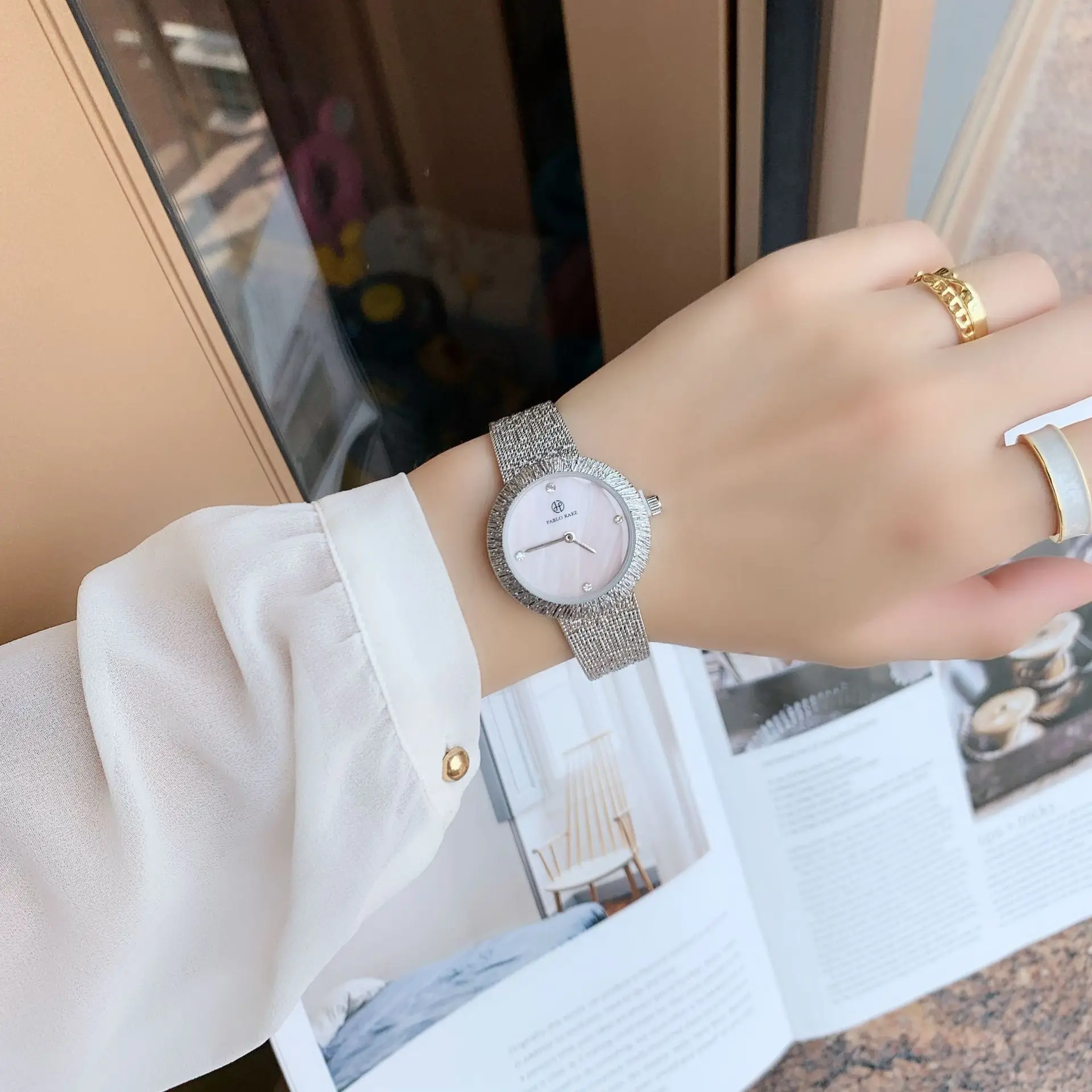 Elegant Silver Steel Watch for Women with Wind Resistant Design - Image 7