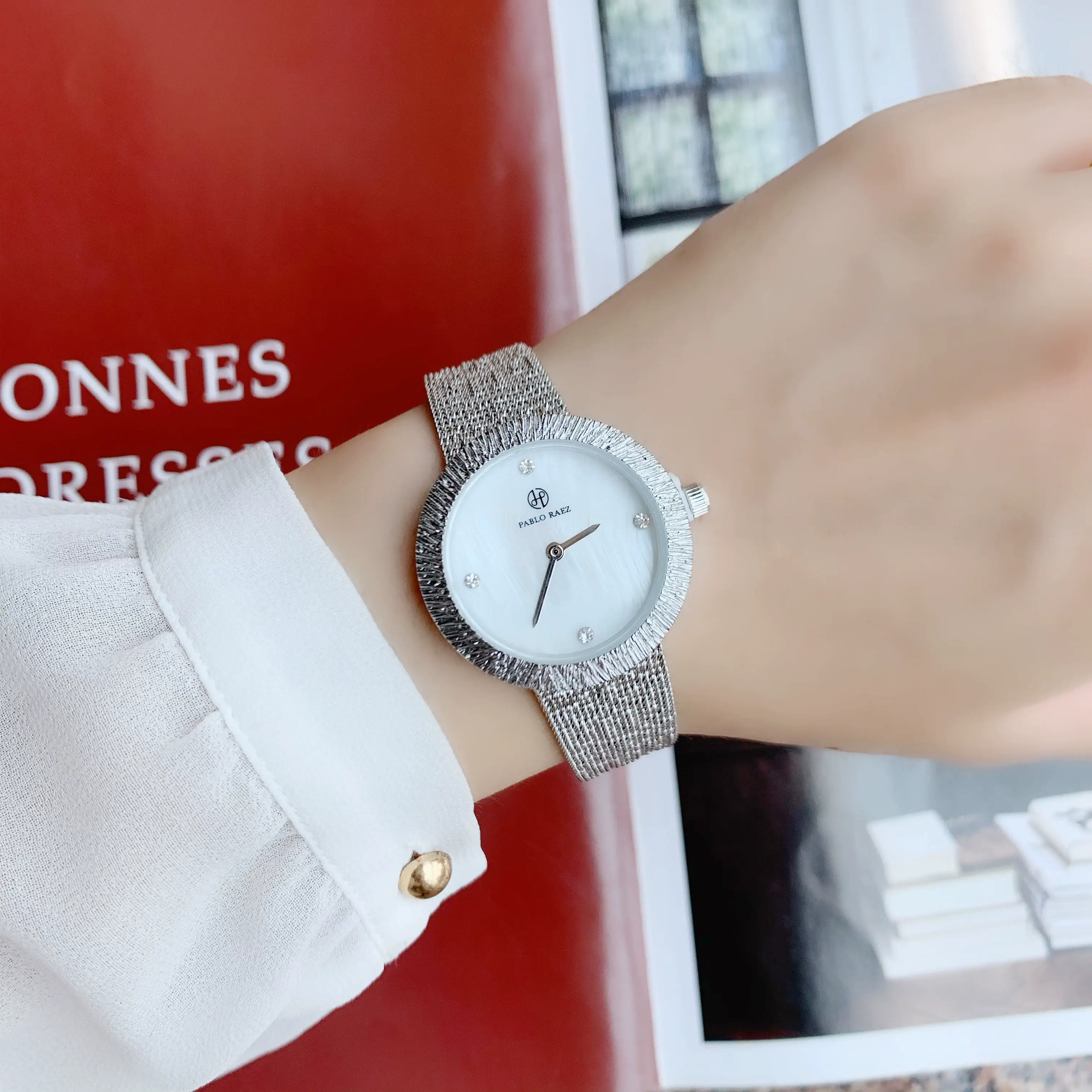 Elegant Silver Steel Watch for Women with Wind Resistant Design — feature 9