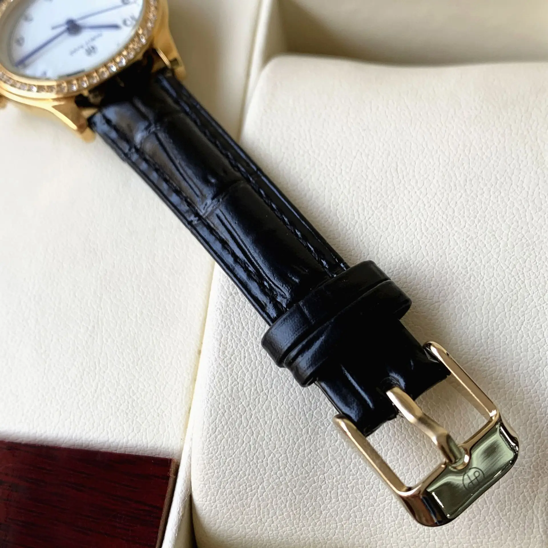 Ladies Gold Rhinestone Watch Black Leather Strap