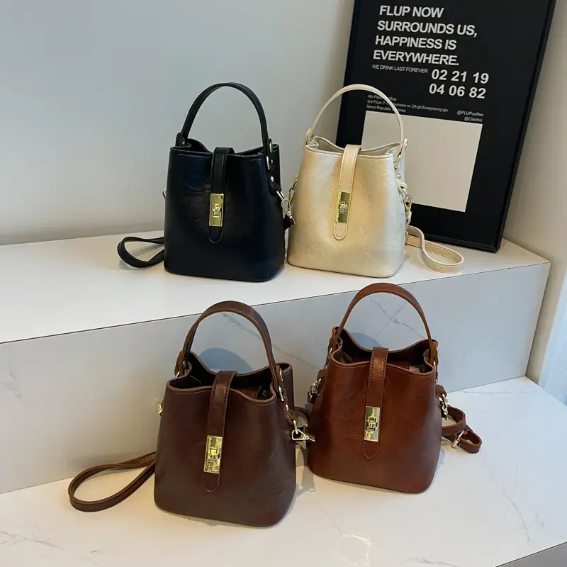 Women's Beige Bucket Bag with Gold Plated Handles - Image 6
